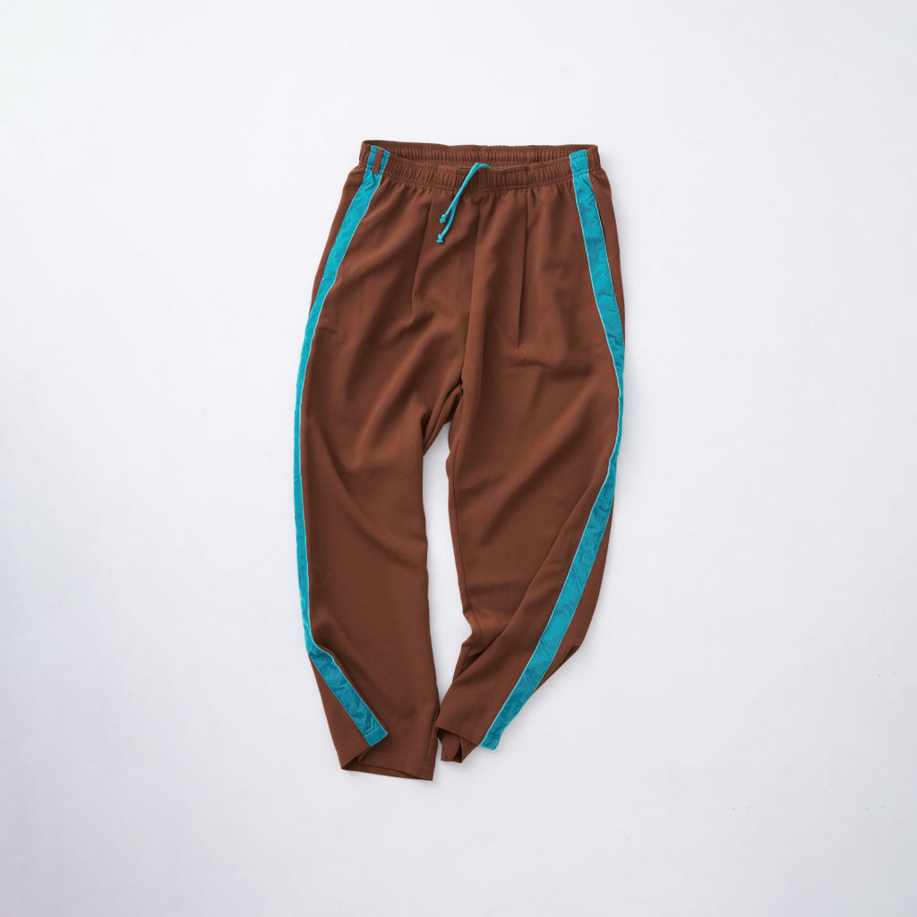 track pants / brown