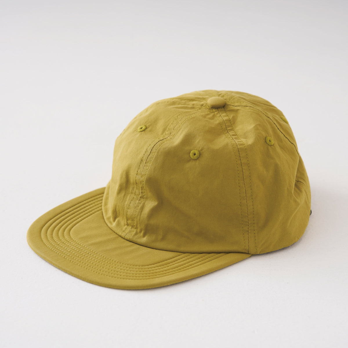 cap / mustard